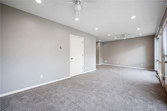 carpeted spare room with recessed lighting, ceiling fan, and baseboards