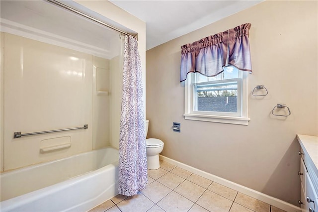 full bathroom with shower / bath combination with curtain, toilet, vanity, baseboards, and tile patterned floors