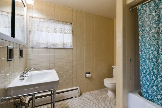 bathroom featuring shower / tub combo, tile walls, toilet, and tile patterned floors