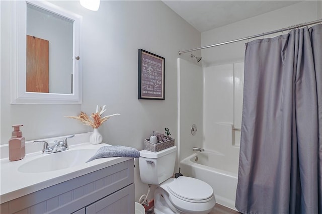 full bathroom with toilet, shower / bath combination with curtain, and vanity