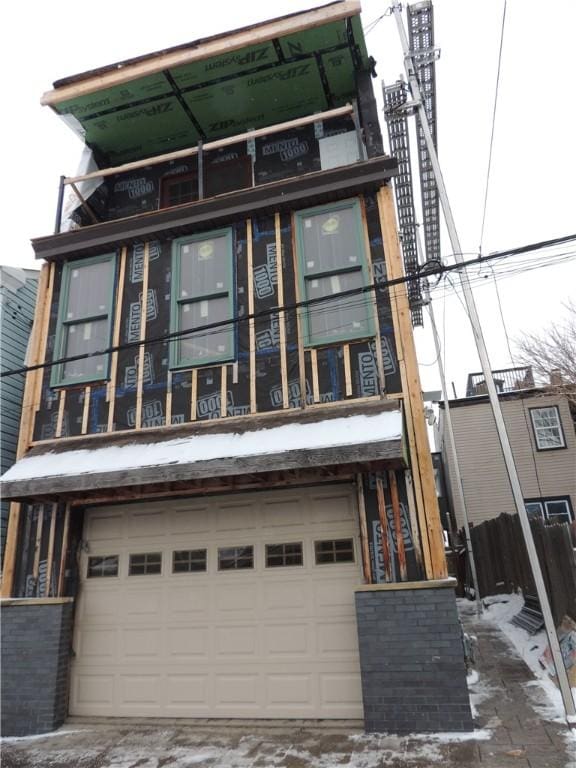 view of front facade featuring an attached garage