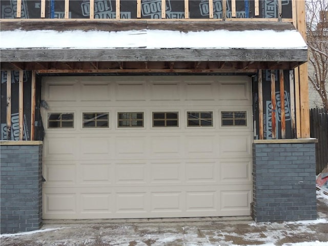 view of snow covered garage