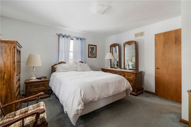 bedroom featuring visible vents and carpet