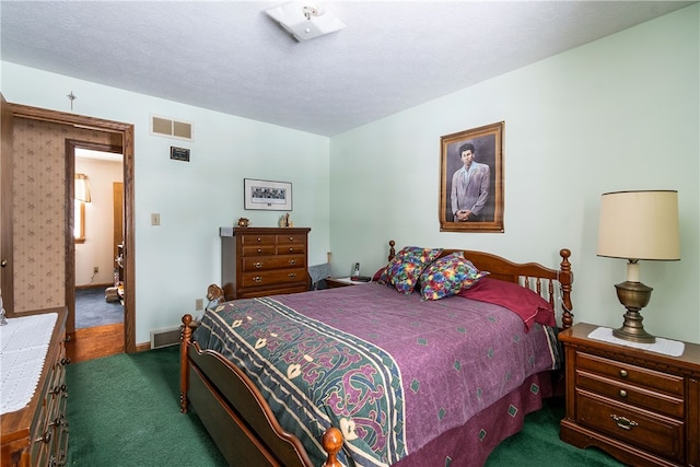 carpeted bedroom with visible vents and baseboards
