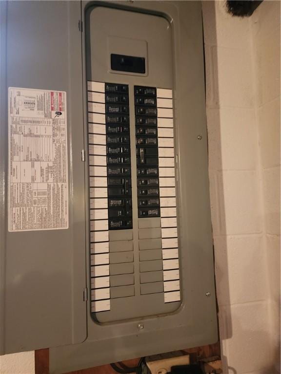 utility room featuring electric panel