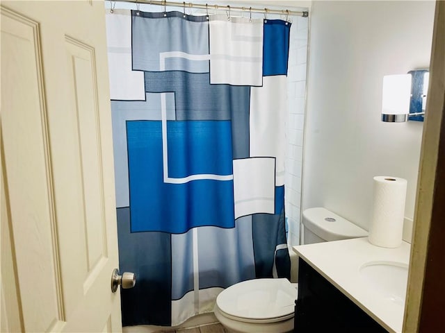bathroom with vanity and toilet
