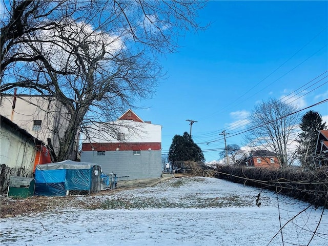 view of yard covered in snow
