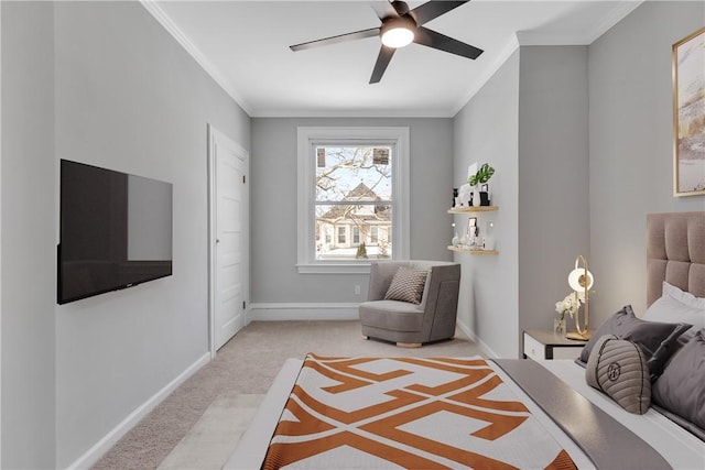 bedroom with crown molding, baseboards, and light colored carpet