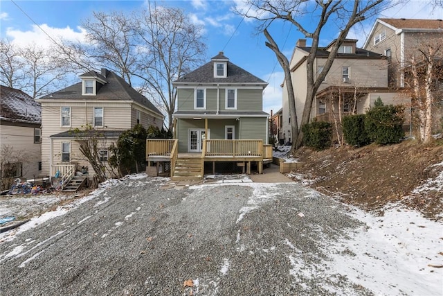 view of front of house with a deck