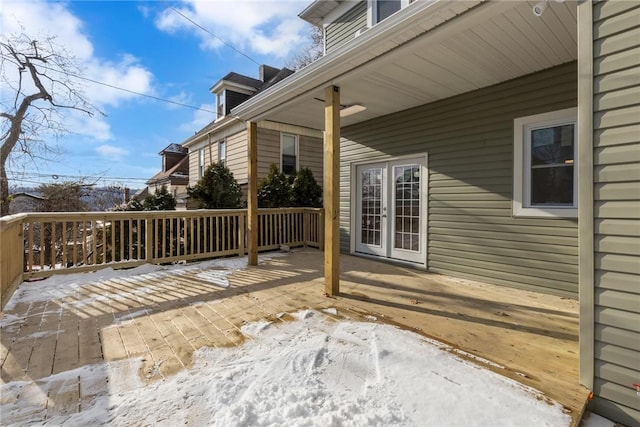 view of snow covered deck