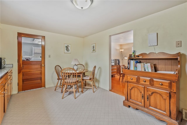 dining room featuring visible vents