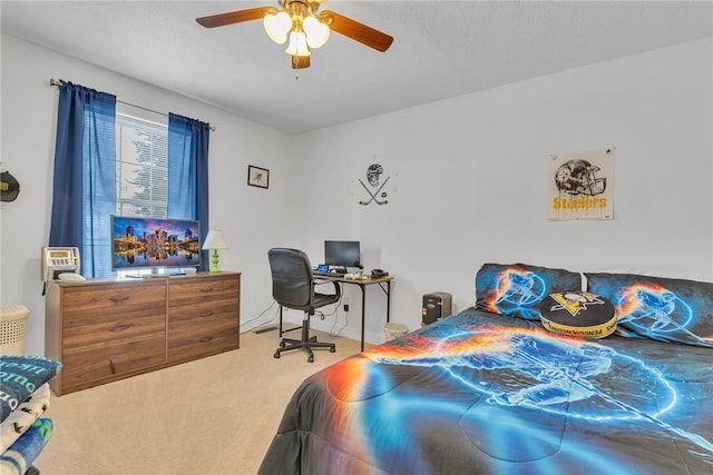 carpeted bedroom featuring ceiling fan