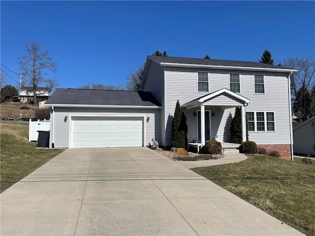 view of front of house with a front yard, concrete driveway, fence, and a garage