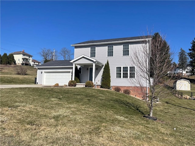 view of front facade with an attached garage, driveway, and a front yard