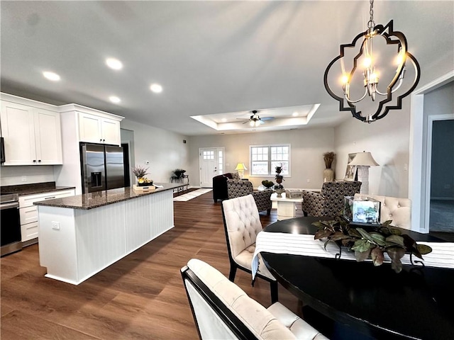 211 Ruby Dr, Menallen Twp, PA 15401 - kitchen featuring open floor plan, stainless steel fridge, recessed lighting, a center island, and a tray ceiling