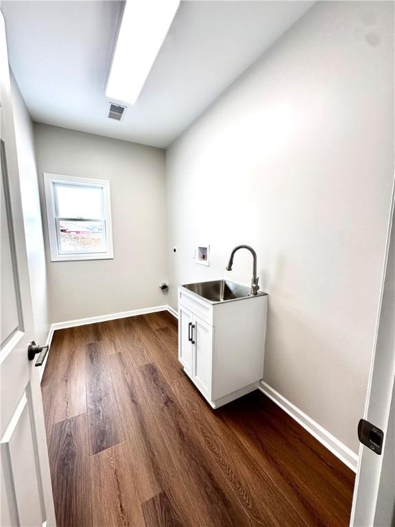 211 Ruby Dr, Menallen Twp, PA 15401 - clothes washing area with washer hookup, hookup for an electric dryer, a sink, baseboards, and dark wood-style floors