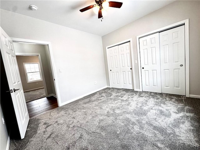 211 Ruby Dr, Menallen Twp, PA 15401 - unfurnished bedroom with carpet floors, a ceiling fan, multiple closets, and baseboards