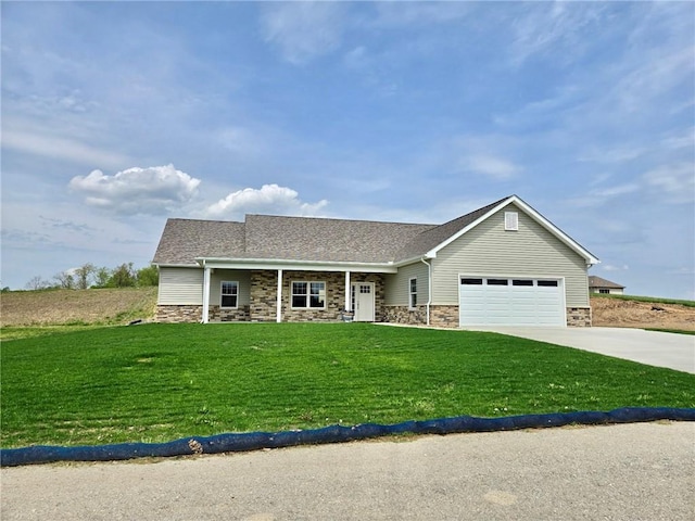 211 Ruby Dr, Menallen Twp, PA 15401 - single story home with an attached garage, a front lawn, stone siding, concrete driveway, and covered porch