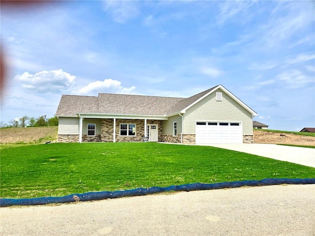 211 Ruby Dr, Menallen Twp, PA 15401 - single story home featuring a garage, concrete driveway, a front yard, and stone siding
