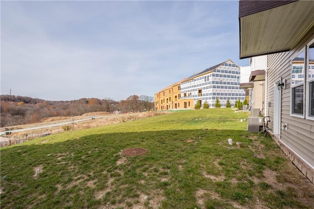 view of yard with central AC