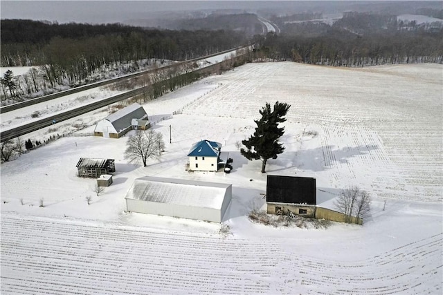 snowy aerial view with a rural view