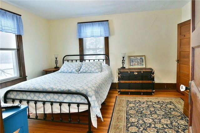 bedroom featuring wood finished floors