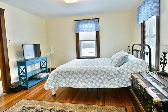 bedroom with wood finished floors