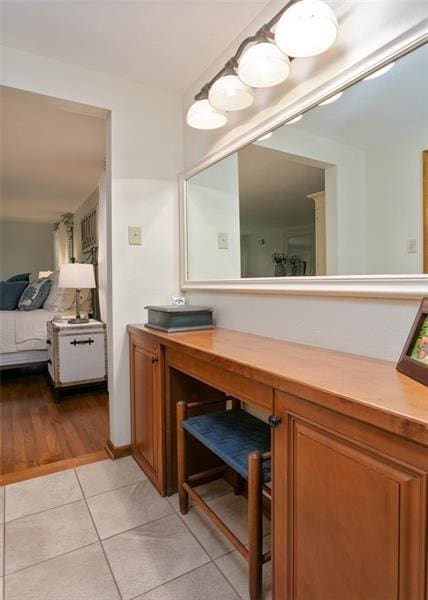 bathroom with tile patterned floors