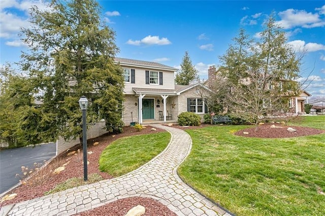 view of front of house with a front lawn