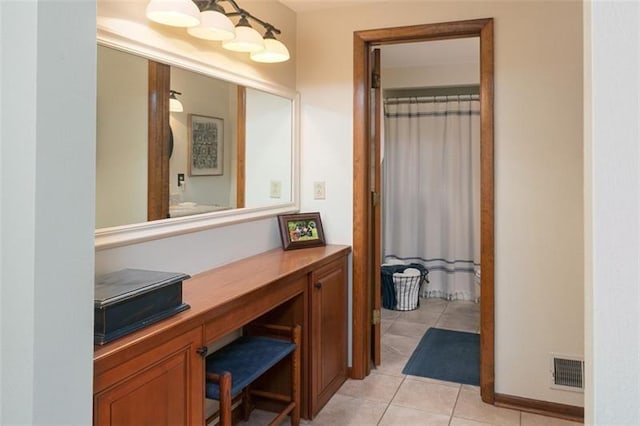 full bathroom featuring vanity, tile patterned flooring, and visible vents