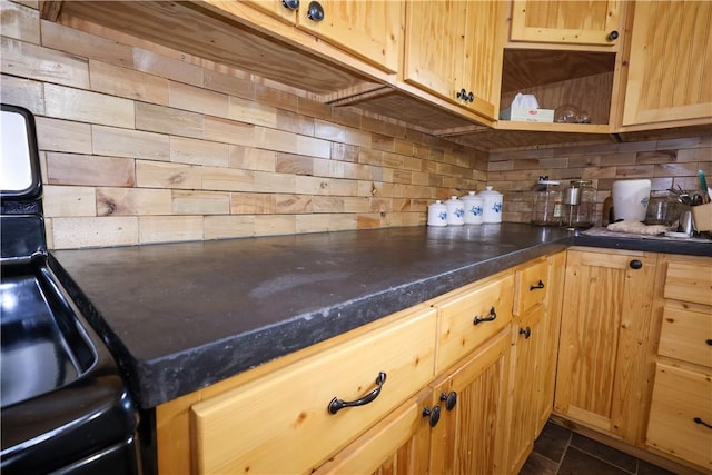 kitchen with open shelves, dark countertops, and backsplash