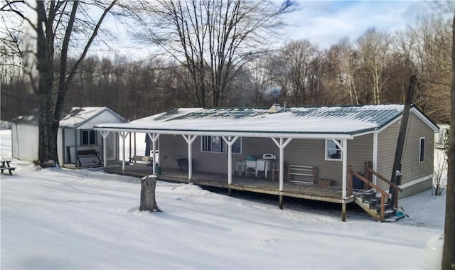 exterior space with metal roof