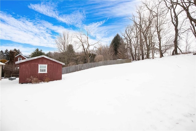 view of yard layered in snow