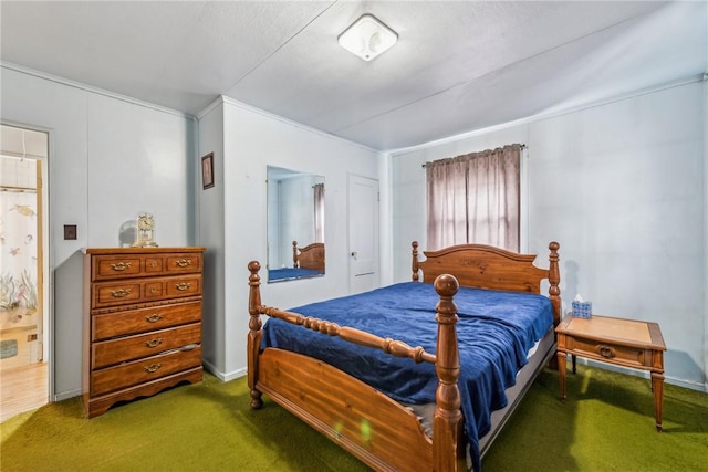 bedroom featuring dark carpet