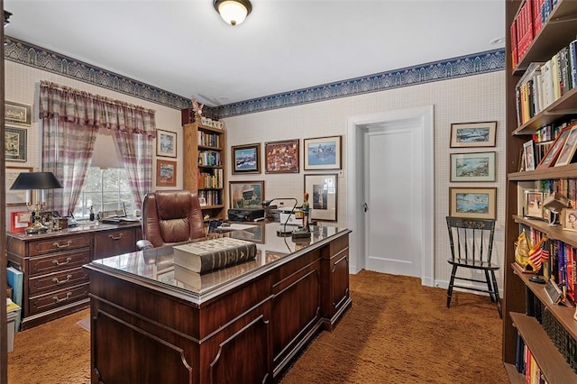 office featuring dark carpet and wallpapered walls