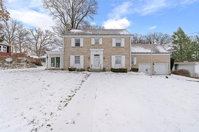 colonial-style house with an attached garage