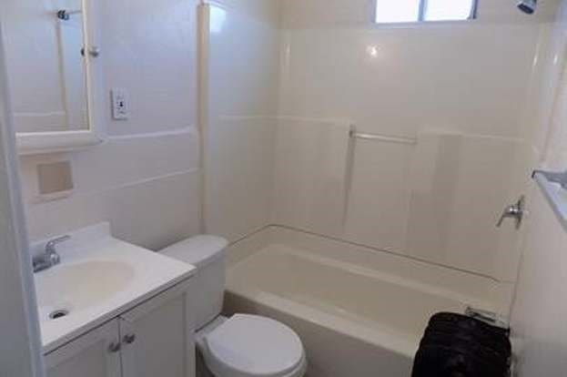 full bathroom featuring toilet, shower / bathing tub combination, and vanity