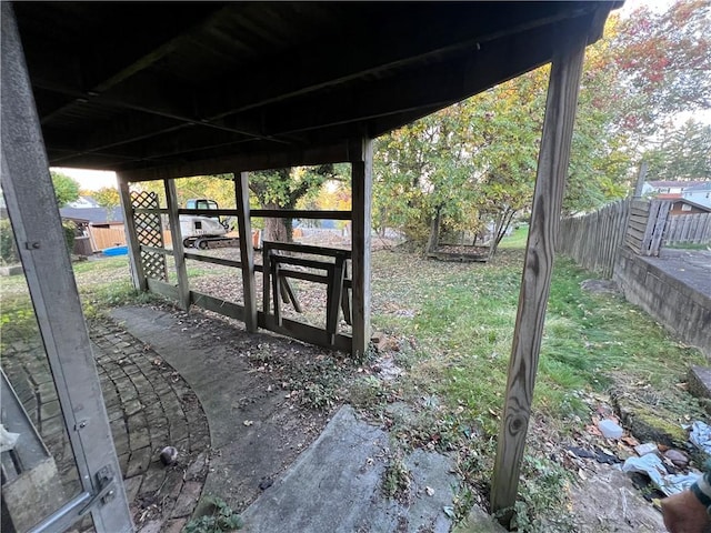 view of yard featuring a fenced backyard and a gate