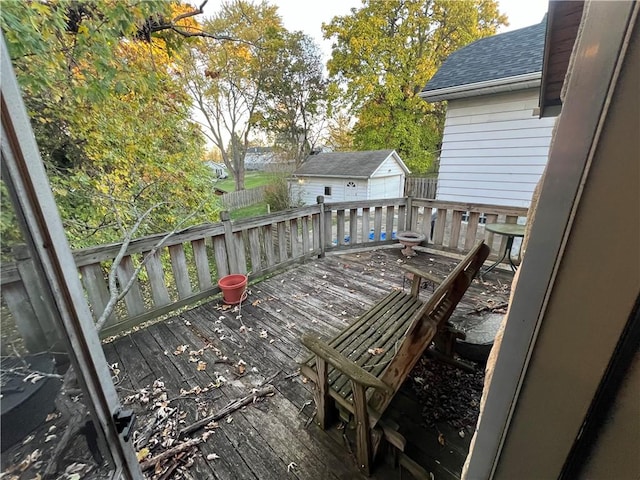 deck featuring an outdoor structure