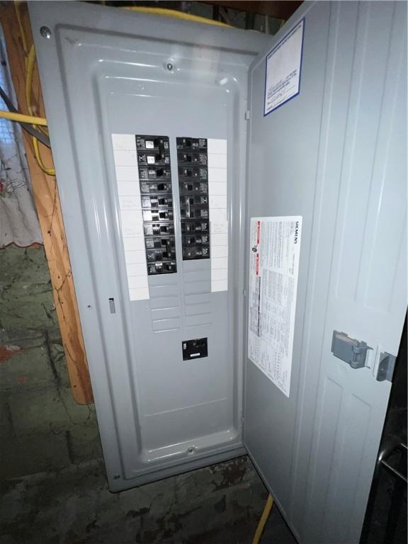 utility room featuring electric panel