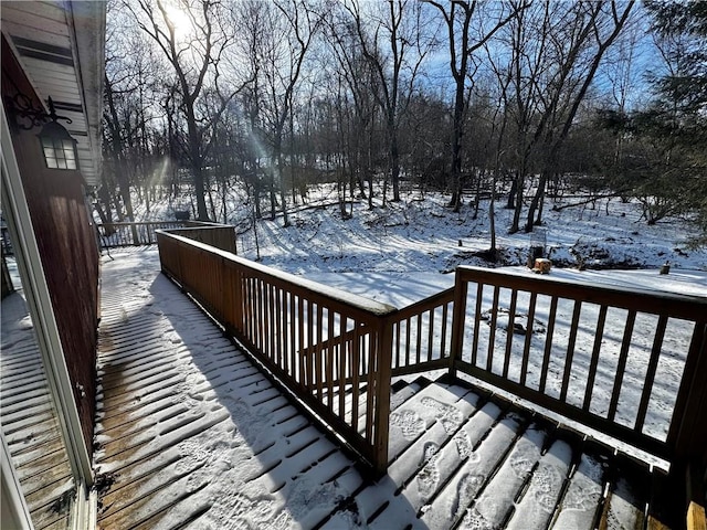 view of snow covered deck