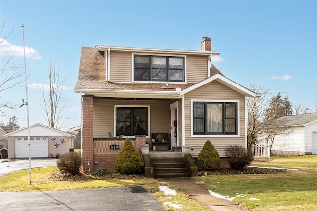 bungalow-style home featuring covered porch, an outdoor structure, roof with shingles, a front lawn, and a chimney