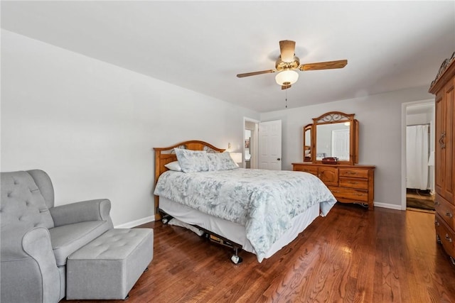 bedroom featuring ceiling fan, baseboards, and dark wood finished floors