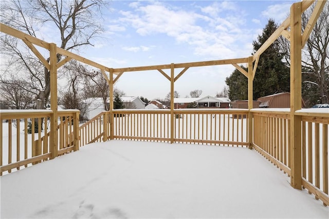 view of snow covered deck