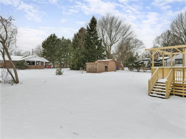 view of yard covered in snow