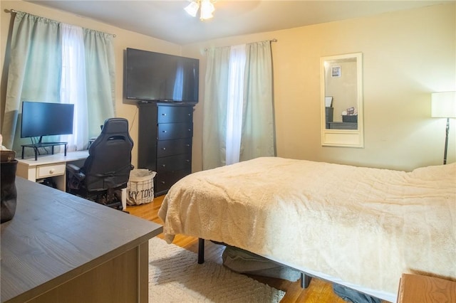 bedroom with light wood-style floors