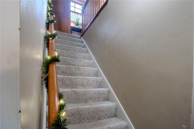 stairway with baseboards