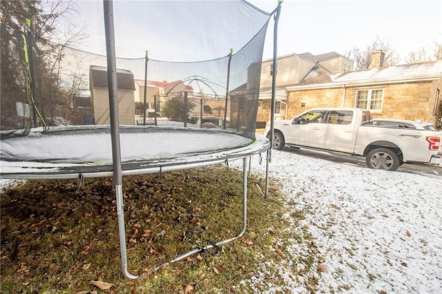 view of yard with a trampoline