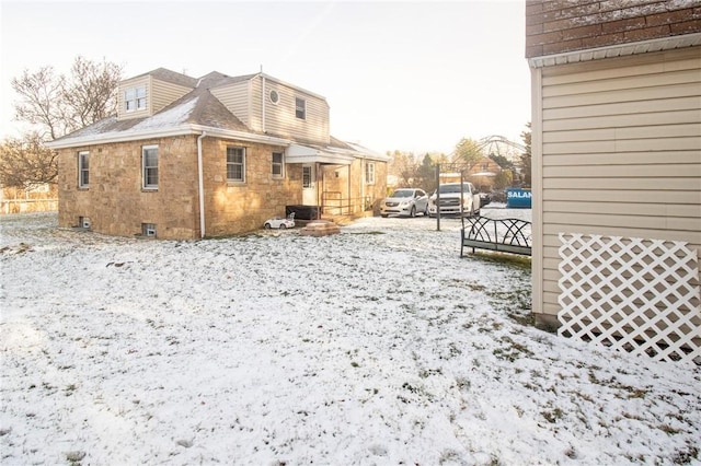 view of snow covered property