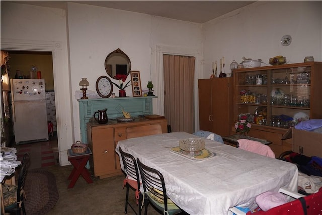 dining area with carpet flooring